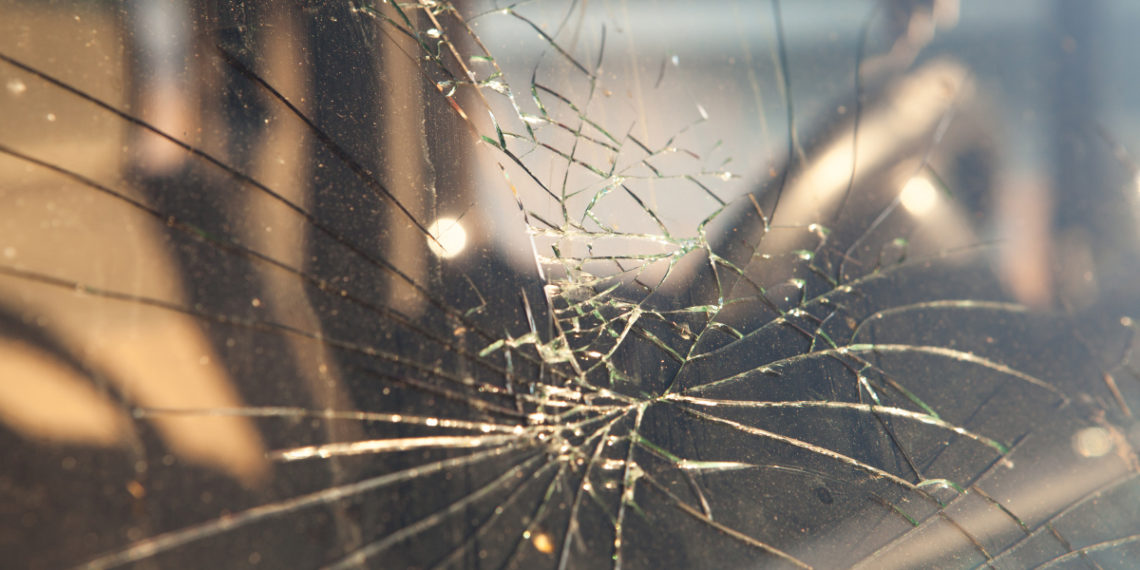 damaged windshield after a car accident.