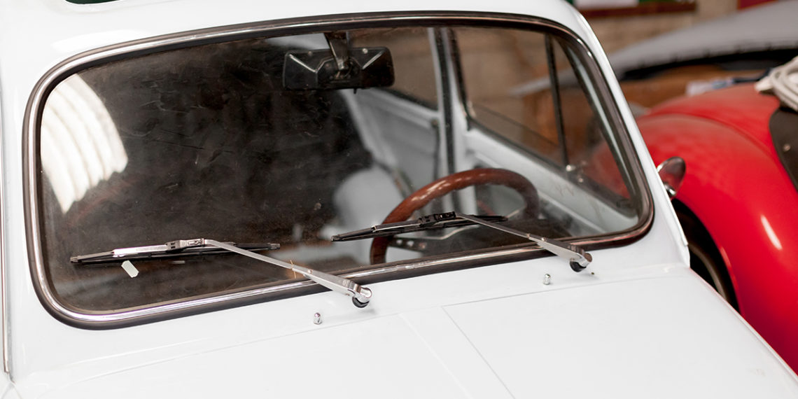 How Long Should My Windshield Last? Blog Post Featured Image of Old Car's Windshield