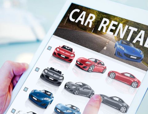 car rental website on a tablet