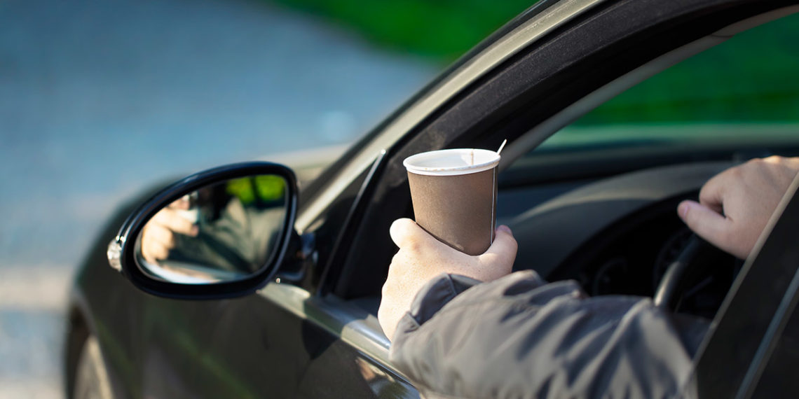 car cup hanging out car window